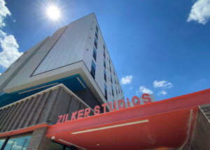 Zilker Studios, looking up at building sign from below